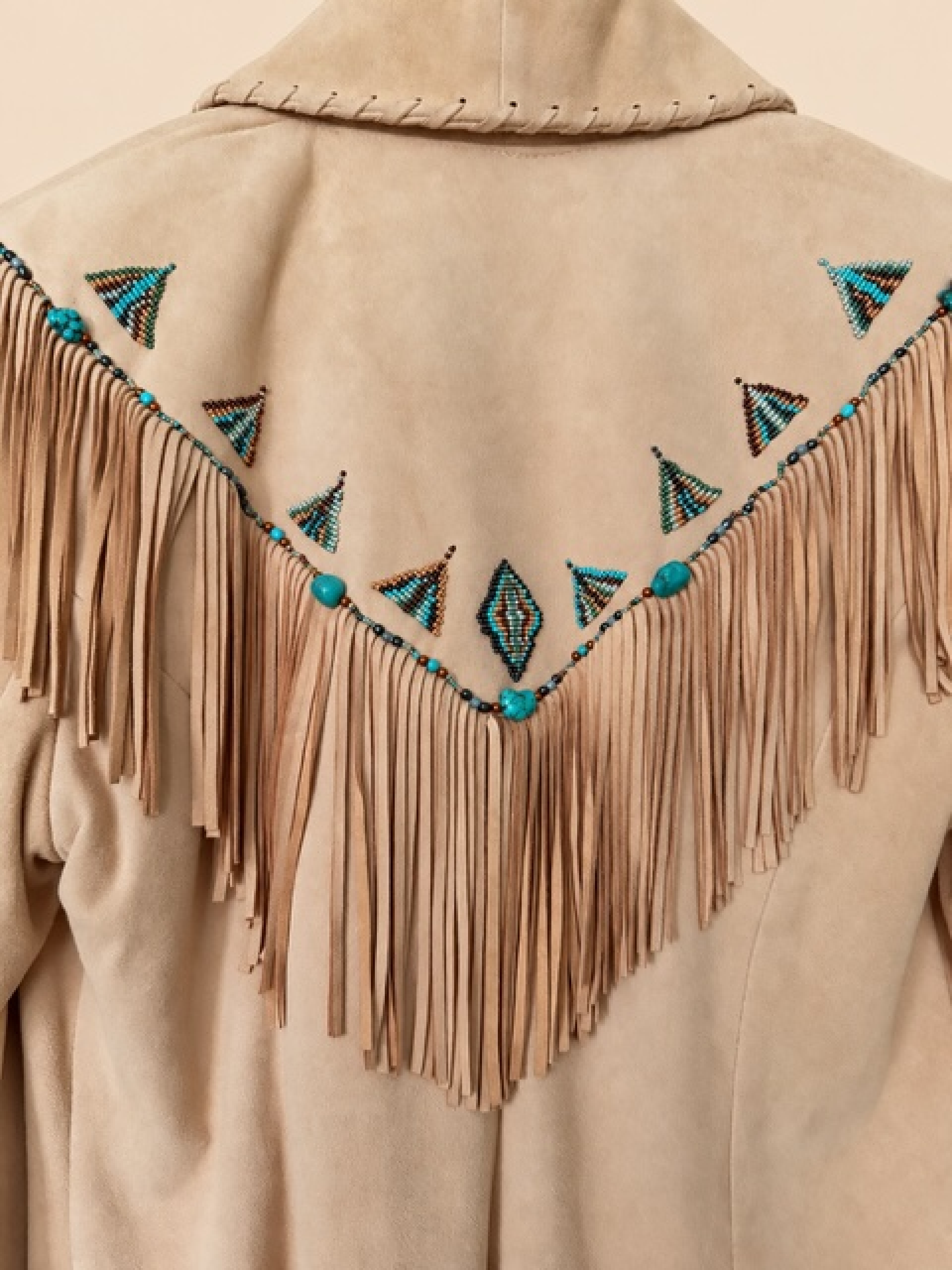 Turquoise and suede collector's jacket
